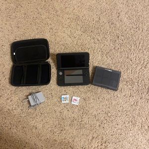 Nintendo 3DS XL with games and accessories